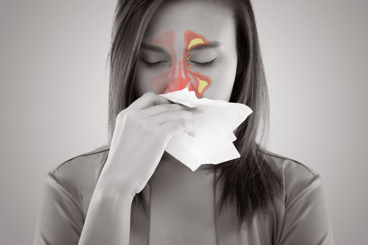 Sinus infection illustration over woman's face.