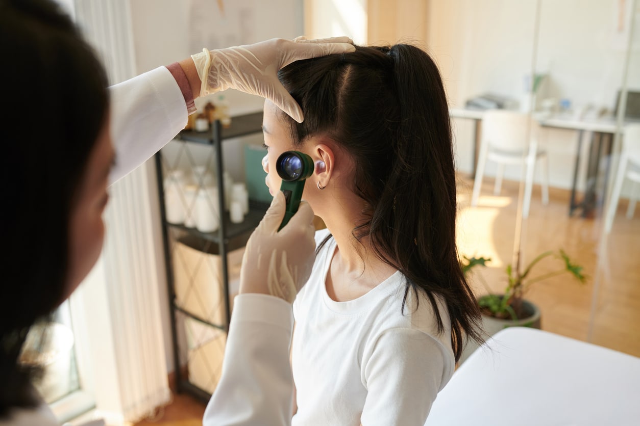 Young girl in an ear exam